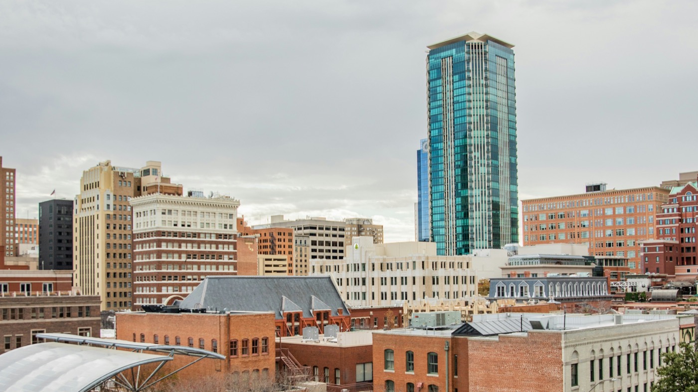 Downtown Fort Worth, Texas, looking across brick storefronts toward the skyline